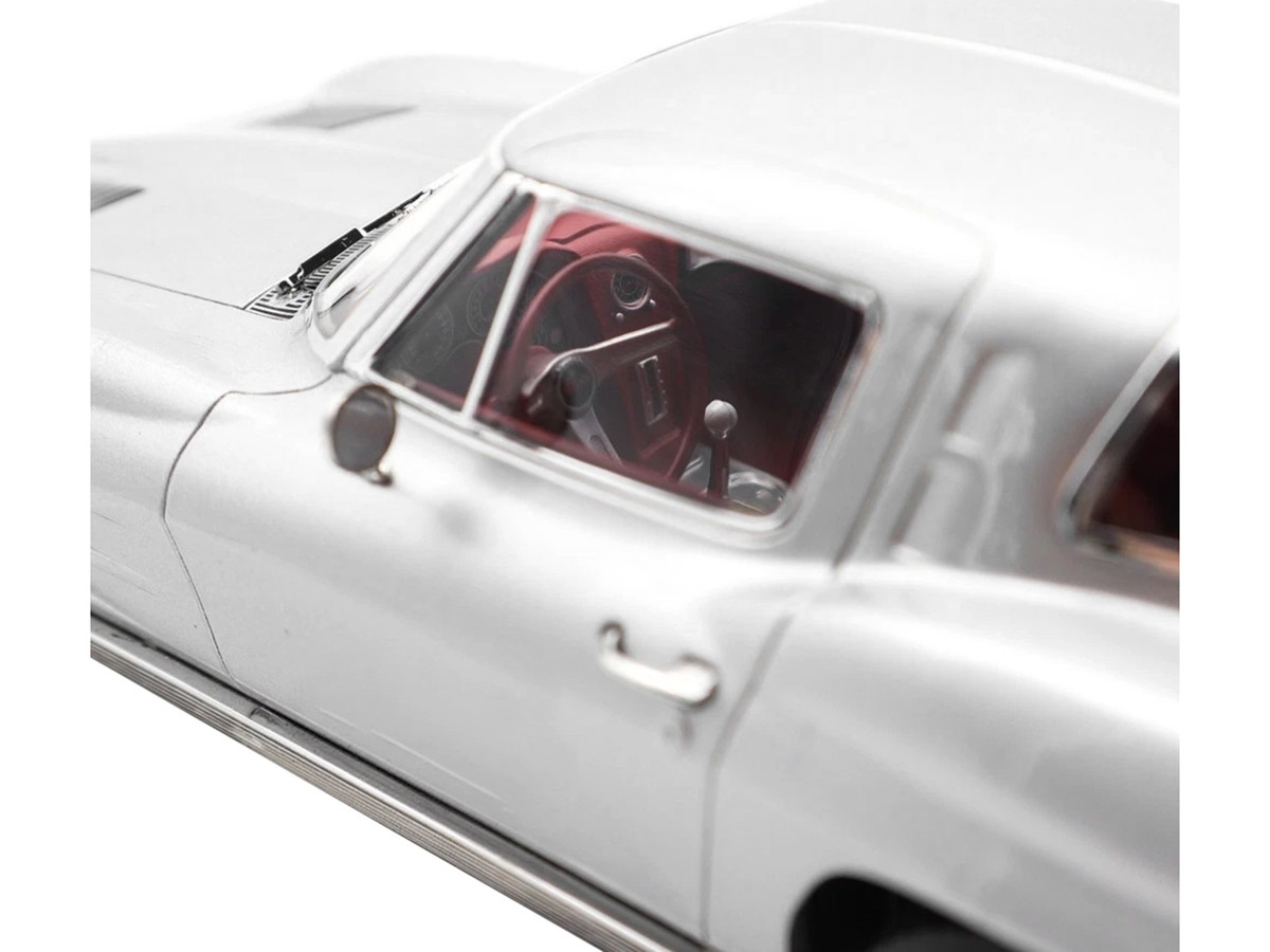 1963 Chevrolet Corvette Sting Ray Sebring Silver Metallic With Red Interior — 1/18 by Norev - Image 3