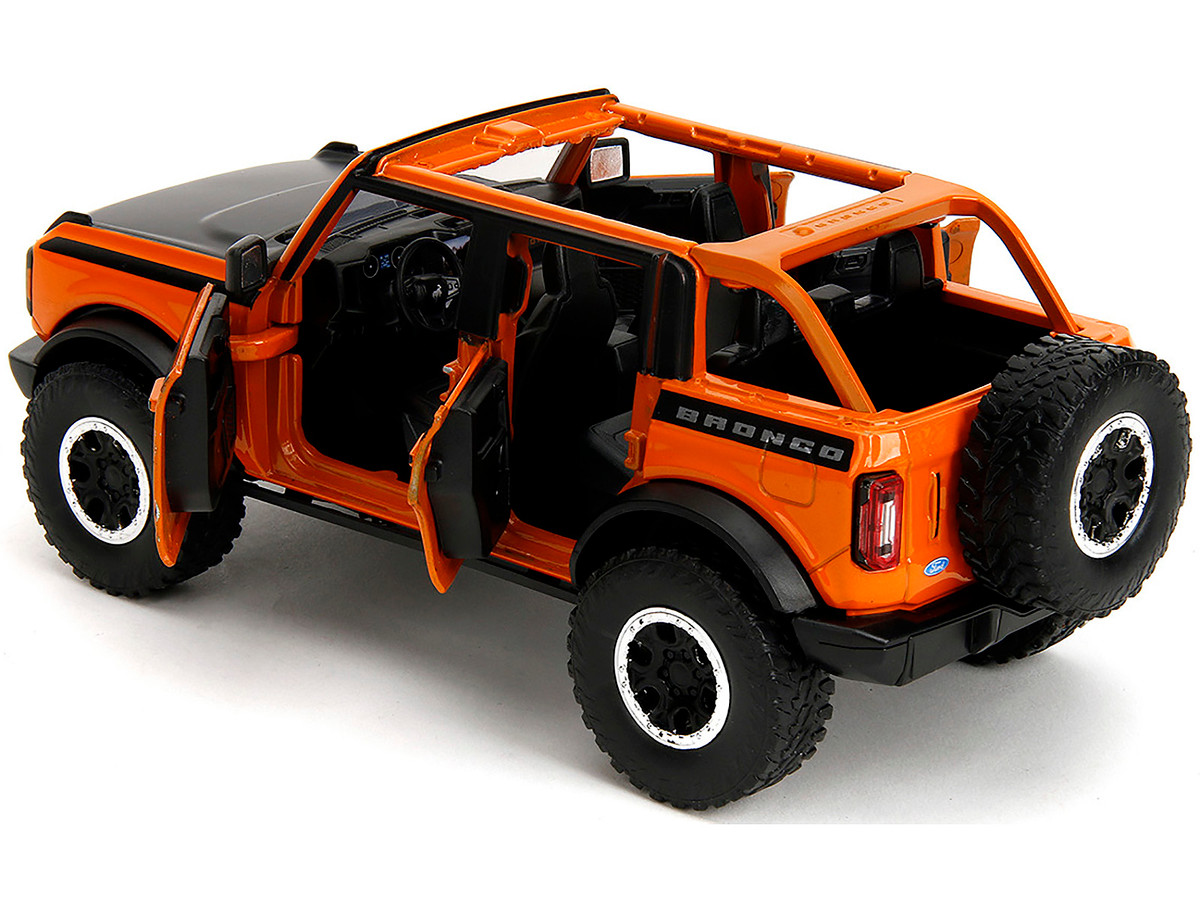 2021 Ford Bronco Open-Top Orange with Black Stripes and Hood with Extra Wheels "Just Trucks" Series 1/24 by Jada - Image 3