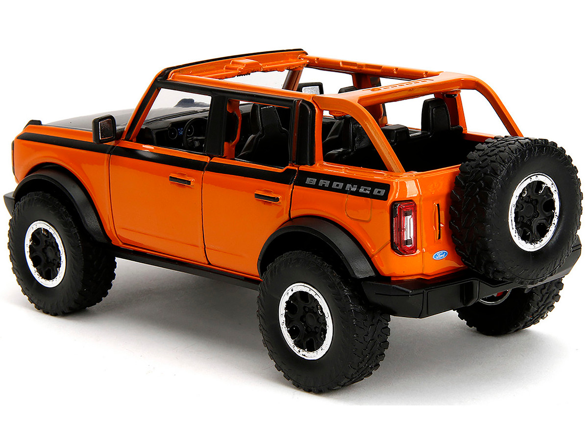 2021 Ford Bronco Open-Top Orange with Black Stripes and Hood with Extra Wheels "Just Trucks" Series 1/24 by Jada - Image 4